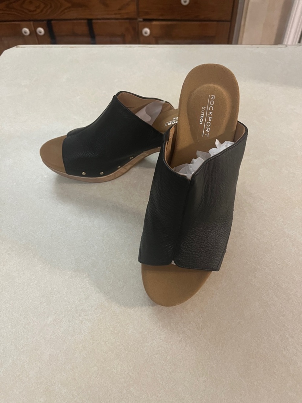 Rockport Black Leather Slide Mule with Tan Footbed, 2 1/2 heel. Rubber sole/8M.